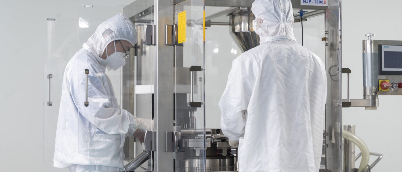 Bito technicians operating pharmaceutical production equipment